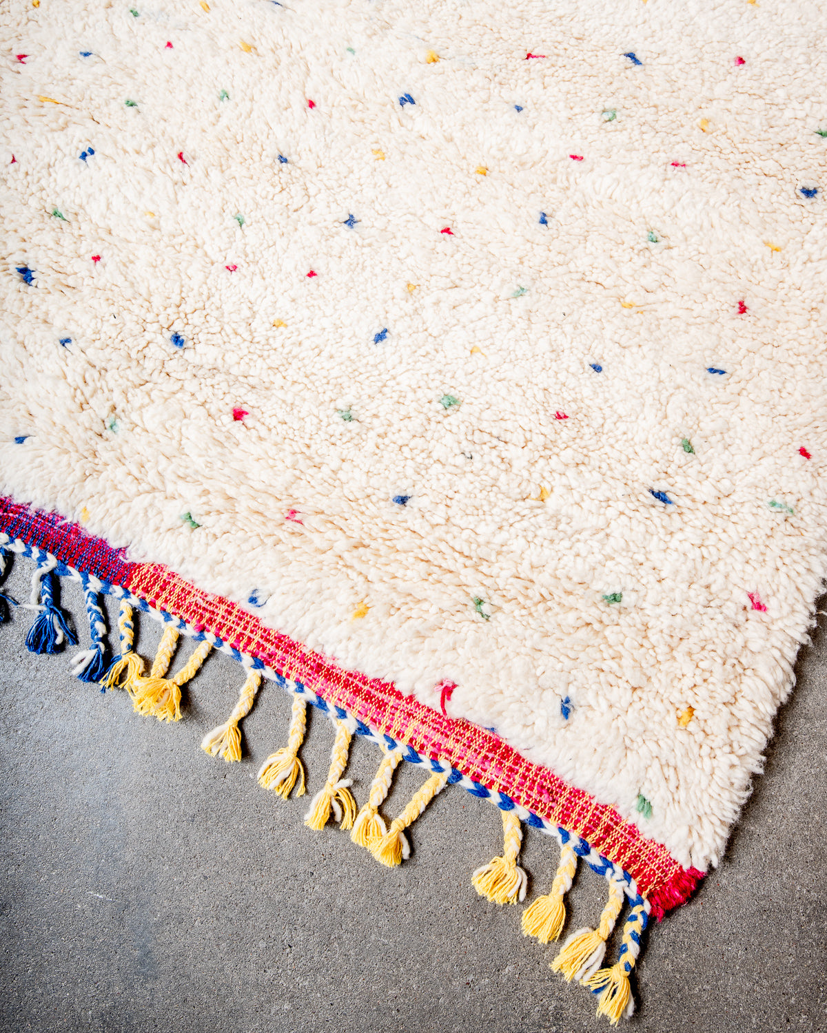 Modern, designer, handcrafted Berber rug from Morocco. Beniourain carpet with beautiful colours and patterns and fluffy wool texture.